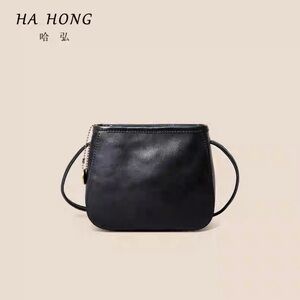 Brown top-grain leather horseshoe bag